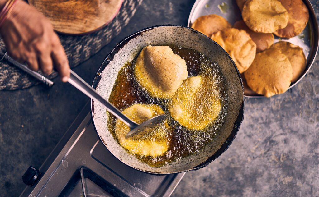 Understanding the Best Cooking Oils to Use showing a variety of cooking oils selected for different cooking techniques and recipes.